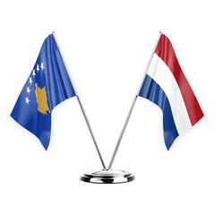 Two table flags isolated on white background 3d illustration, kosovo and netherlands