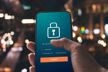 Cybersecurity internet and networking concept. Close up of hand holding smartphone information security and encryption, secure access to user's personal information, secure Internet access.