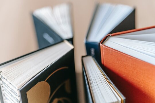 Books placed in circular fan shape in close-up