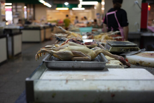 Raw chicken meat disposed in a market