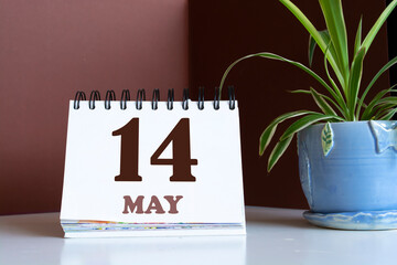 May 14 written on a calendar to remind you an important appointment.