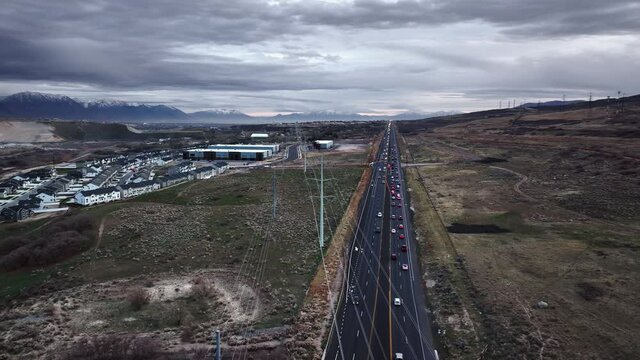 Awesome Aerial view of S Redwood Road and Beautiful Landscape in Bluffdale Utah, Truck Left and Panning Movement