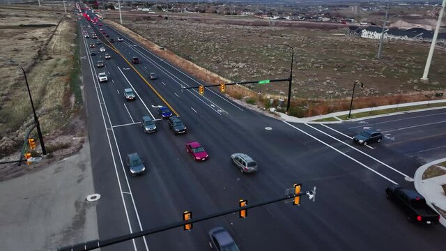 Aerial View of Vehicles Trafiic at Light over S Redwood road Street in Bluffdale Utah, Orbit Movement