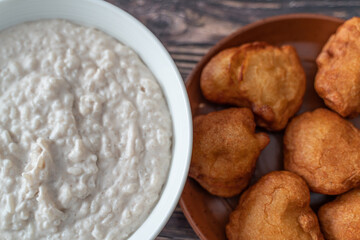 Bowl of Kunun Gyada with Akara bean Cakes ready to eat