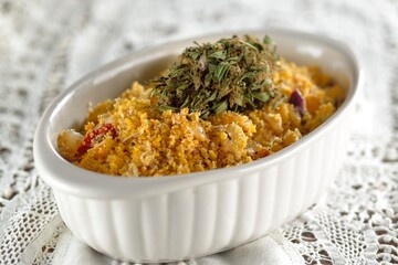 Farofa Crumbbs of marijuana, cornmeal, onions, eggs, tomato and cannabic butter 