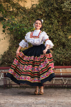 Colombia and its diversity: Colombian woman in typical folk dance costume. Traditions and cultures of the world.