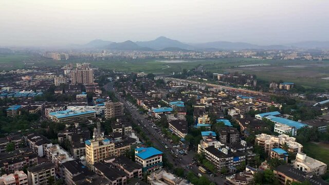 Buildings and Streets in Suburban Area of Vasai, Mumbai, India - aerial drone shot