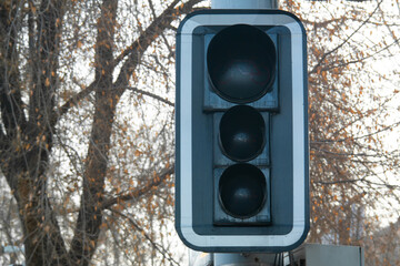 Turned off traffic light for bicycle close up