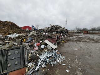 Wide angle view of trash and scrap pile