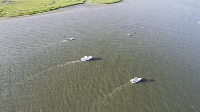 Boat riding on the ocean in Charleston South Carolina Aerial