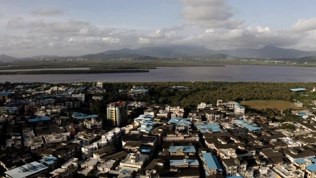 Fast-growing Bhayandar East Suburb Residential Houses Near Vasai Creek In Mumbai, India. - aerial