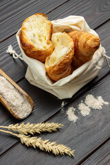 Croissants in linen bag.