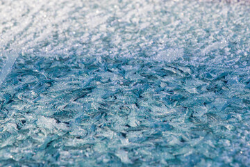 Frozen window and glass of the car, frozen dew water pattern and texture