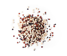 Pile of mixed raw quinoa isolated on white background