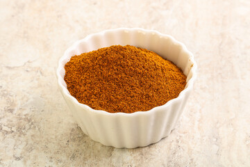 Dry Paprika powder in the bowl
