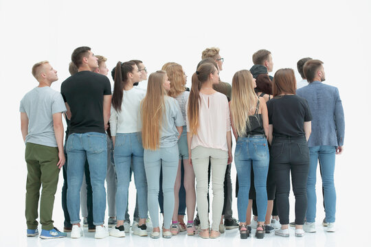 Rear View. A Group Of Young People Looking In One Direction