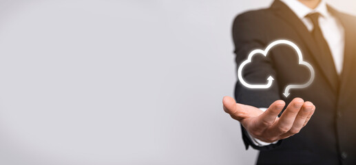 Business woman holding icon cloud computing network and icon connection data information in hand. Cloud computing and technology concept.