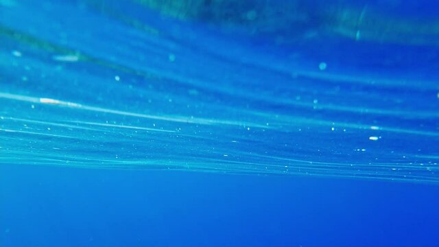 microplastic on the sea surface. irreparable water pollution sea
