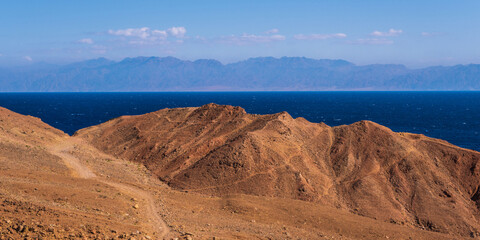 panorama view from the height of the mountains range  to the blue sea