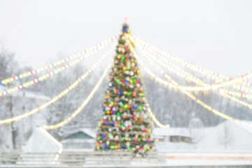 Blurred christmas tree and christmas lights, christmas background concept.