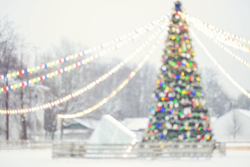 Blurred christmas tree and christmas lights, christmas background concept.