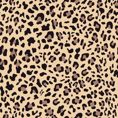 Leopard print vector seamless pattern, yellow background, trendy modern print pattern.