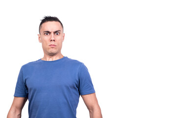Fototapeta premium Serious man standing with a surprised expression