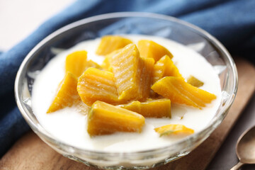 Thai dessert from pumpkin and coconut milk on tray