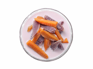 Thai dessert from sweet potato and coconut milk on white background