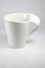Obraz premium White cup on white background.