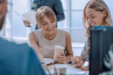 young business woman sitting at office Desk