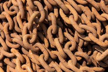 Construction chain. Rusty chains background. Chain used for lifting loads on a construction site