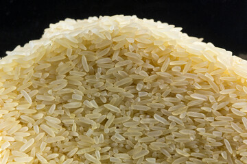 White and yellow rice grains close-up