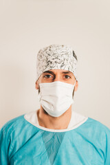 Chiropodist surgeon looking at camera before surgery