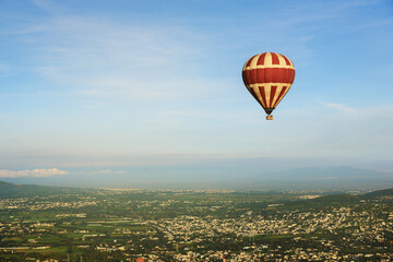 Hot Air Balloon Flight over Teotihuacan at sunrise in  Mexico. View from the top.