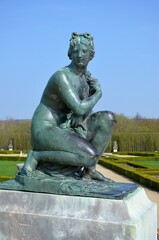 Fototapeta premium Statue in the gardens of Versailles Palace, Paris (France)
