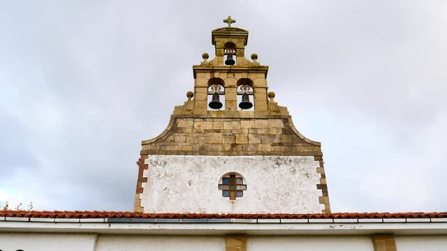 Old small church with bell tower in north Spain. Iglesia de San Martin de Podes in Asturias.