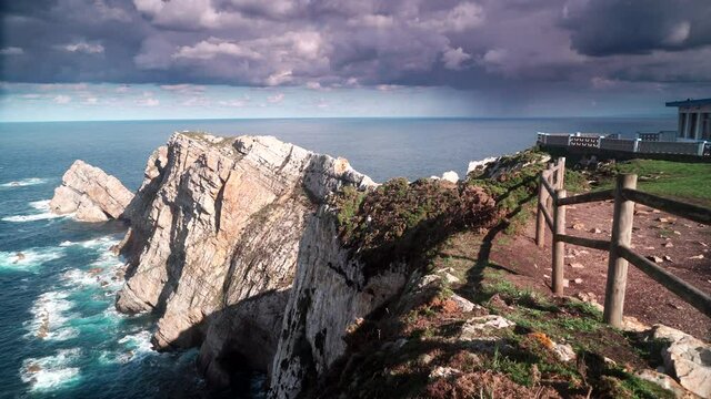 Seascape of Atlantic ocean and Asturias rocky coast at Cape Penas. Sea shore with high cliffs in north Spain.