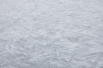 Frozen ice skating surface as background. Winter season