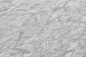 Frozen ice skating surface as background. Winter season