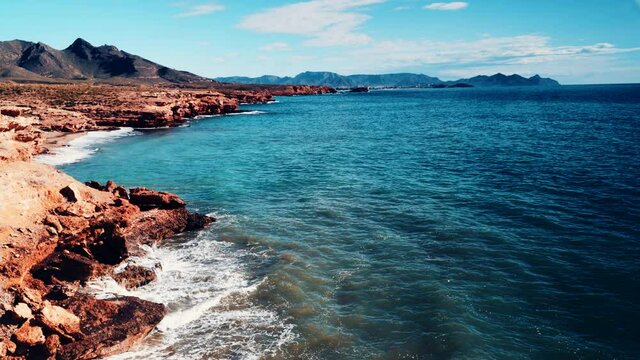 Seaside landscape. Spanish coast view, shoreline with cliffs. Mediterranean region of Mazarron Bay, Sierra de las Moreras in Murcia, Spain