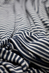 blue and white woolen fabric striped background