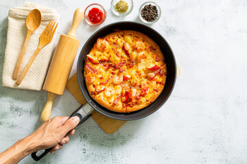 Pizza,Delicious pepperoni pizza and basil tomato cooking ingredients on black concrete background, top view of hot pepperoni pizza. With copy space for text lay flat, banner
