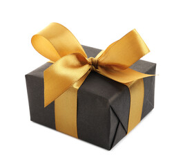 Black gift box with golden bow on white background