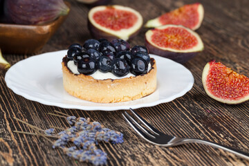 tartlet with cream and blueberries