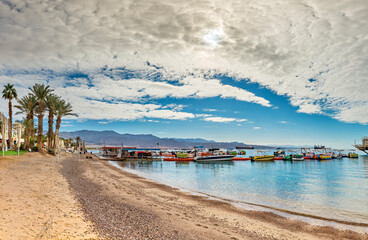 Panoramic view on central beach in Eilat - famous tourist resort and recreational city located on the Red Sea, Israel