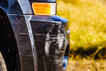Fototapeta premium Rear bumper of black car get damaged by accident.