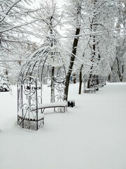 Snow-covered gazebo