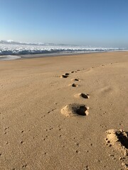 footprints on the beach