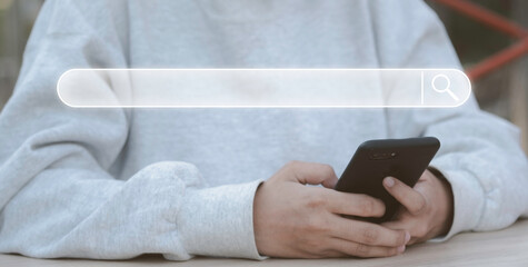 Searching for information, Search engine technology in web browsers, using search engines to find information in the Internet, SEO concept. Businessman's hand touch smartphone.